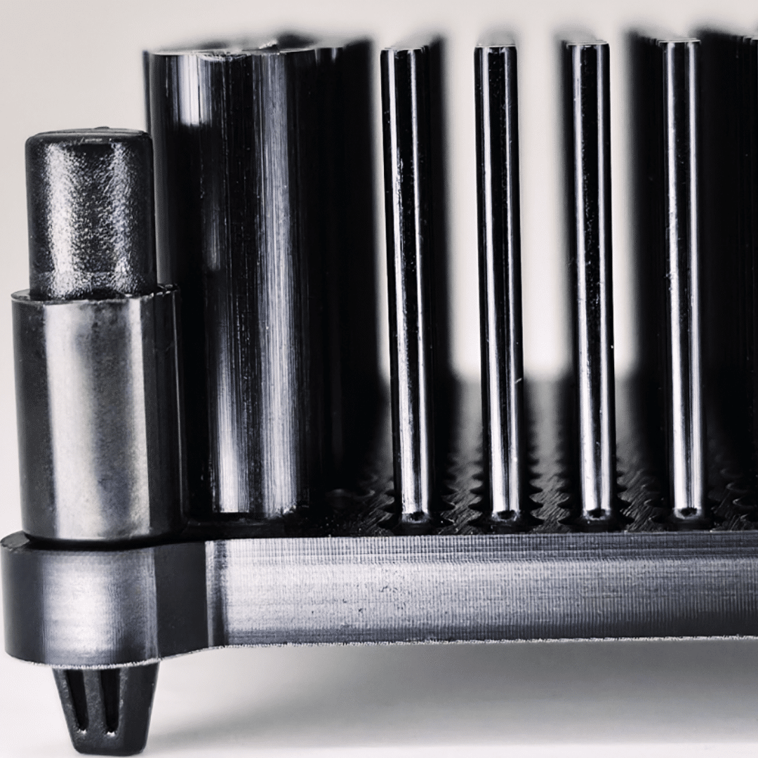 Close-up of Dark Horse Bitaxe heatsink upgrade showing mounting post and cooling fins, black