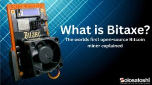 What is Bitaxe? The world's first open-source Bitcoin ASIC miner with OLED display and cooling fan on a Solo Satoshi branded stand