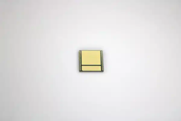 Rear-side view of a Bitmain BM1370PA ASIC chip used in Bitaxe, Nerdaxe and NerdQaxe DIY solo Bitcoin mining boards, showing the exposed thermal pad and gold contact array.