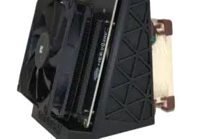 Side-profile of the NerdQaxe ++ Bitcoin solo miner showcasing its Thermalright front fan, rear Noctua exhaust, and geometric Solo Satoshi stand for superior airflow.