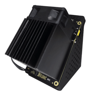 Bitaxe GT (Gamma Turbo) solo Bitcoin miner on an angled stand with a large black heatsink and fan housing.