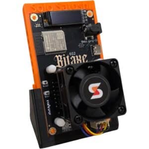 Bitaxe Gamma 602 mini bitcoin miner with Dark Horse heatsink, OLED display, and cooling fan on orange Solo Satoshi 3D printed stand