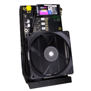 NerdQaxe++ REV 6.1 front view with OLED status display and 120mm cooling fan on Solo Satoshi stand