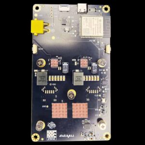 Bitaxe GT 801 back view with four copper MOSFET heatsinks installed on dual VRM zones behind each BM1370 ASIC chip and two inductors labeled 100792