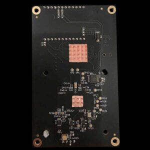 Nerdaxe Gamma back view with two copper MOSFET heatsinks installed on the VRM voltage regulator zone behind the ASIC area