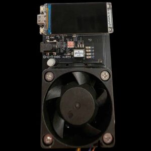 Nerdaxe Gamma front view with a copper MOSFET heatsink installed on the VRM zone near the power input and Coilcraft inductor