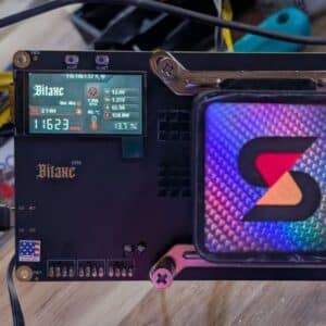 Bitaxe Naja Duo with AIO hydro cooler overclocked to 11,623 GH/s at 158.8W, LCD showing 46C ASIC temperature