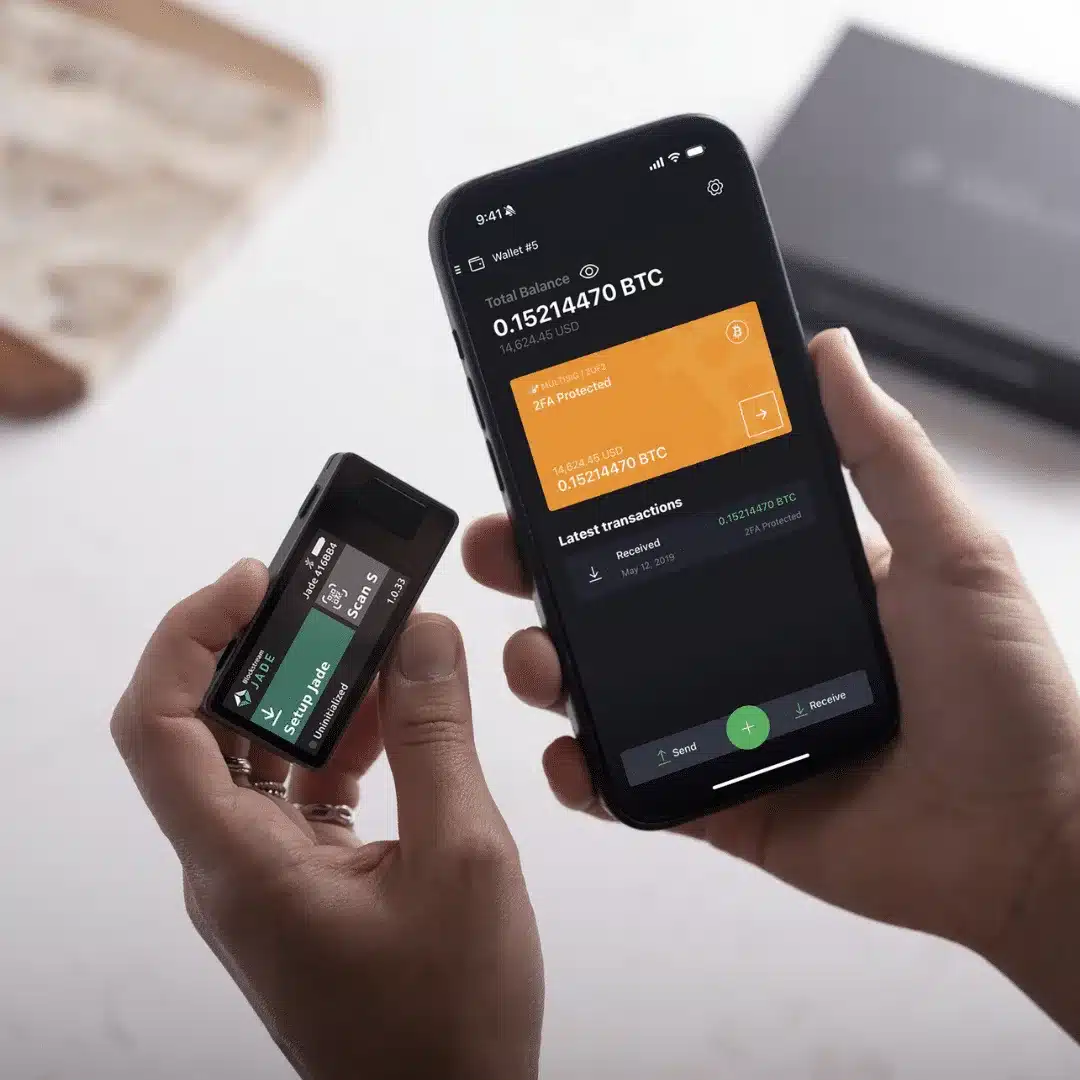 Blockstream Jade bitcoin hardware wallet paired with mobile app during setup and balance view